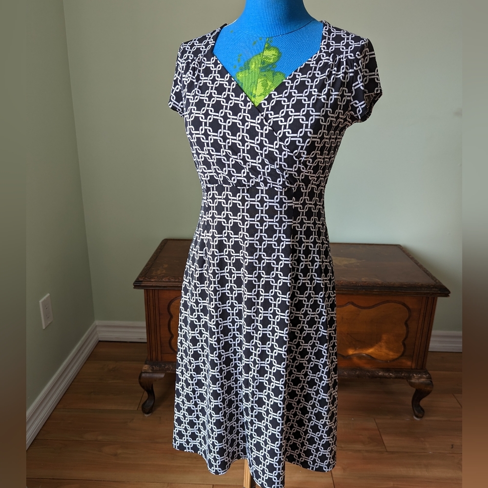 Navy white patterned office dress.  Empire waist Cleo